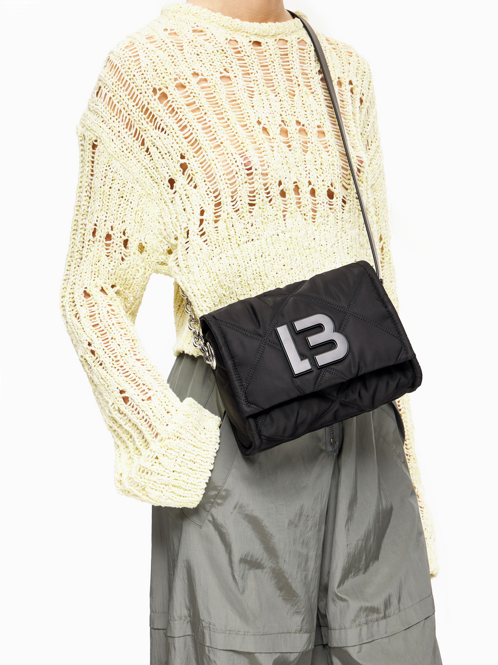 Bimba-Y-Lola-Small-Black-Padded-Nylon-Crossbody-Bag-With-Flap-Balilene-onmodel