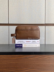 Coach-Small-Travel-Kit-With-Whipstitch-Saddle-balilene