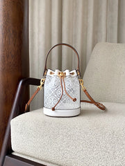 Tory-Burch-T-Monogram-TPU-Mini-Bucket-Bag-Clear-balilene