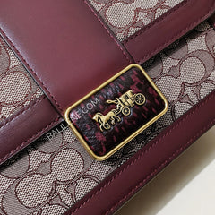 detail-Coach-Alie- Shoulder- Bag- in-Signature-Jacquard-With- Snakeskin -Detail -Burgundy/Black/Cherry
