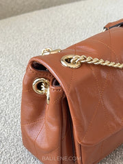detail-Coach-Elodie-Crossbody-Bag-18-With-Quilting-Cinnamon-balilene