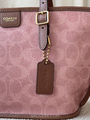 detail-Coach-Taxi-Tote-Bag-21-In-Signature-Canvas-Pink-Sable-balilene