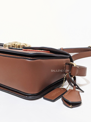 detail-bagian-bawah-Coach-Studio-Shoulder-Bag-19-With-Patches-Saddle