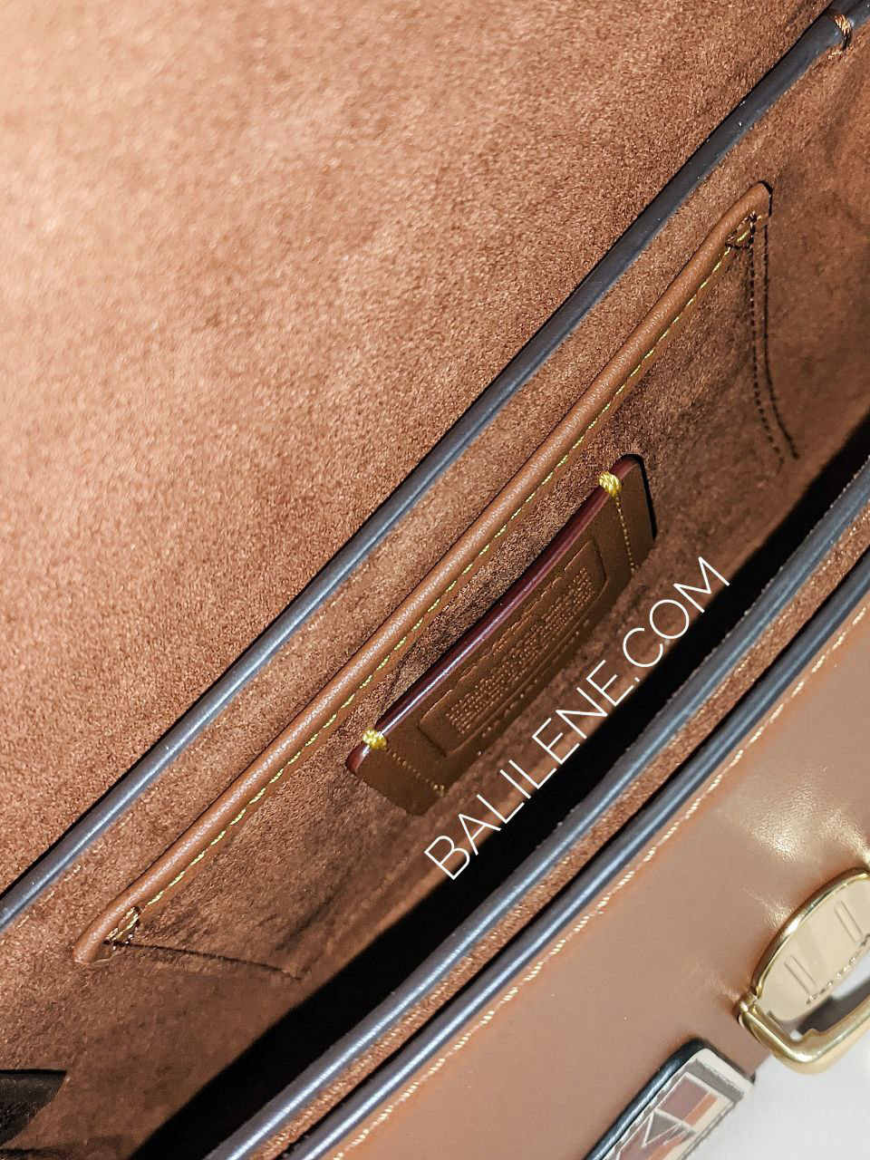 detail-bagian-dalam-Coach-Studio-Shoulder-Bag-19-With-Patches-Saddle