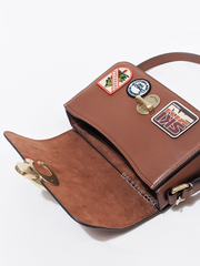 detail-closure-Coach-Studio-Shoulder-Bag-19-With-Patches-Saddle