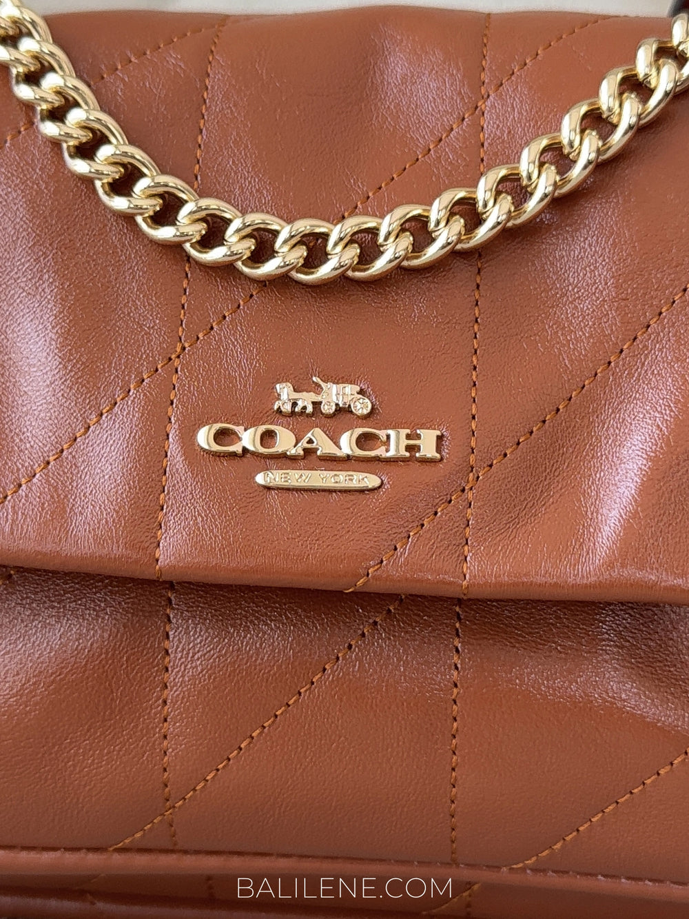 detail-depan-Coach-Elodie-Crossbody-Bag-18-With-Quilting-Cinnamon-balilene