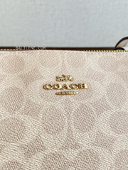 detail-depan-Coach-Zip-Top-Tote-In-Signature-Canvas-Sand-Chalk-balilene