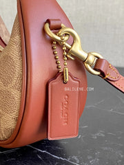 detail-samping-Coach-Jonie-Bag-In-Signature-Canvas-Tan-Rust-balilene
