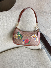 gambar-Coach-Teri-Shoulder-Bag-In-Signature-Canvas-With-Sticker-Print-Gold-Tan-Multi-balilene