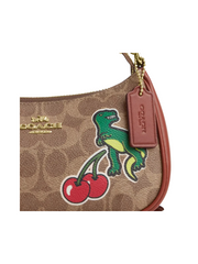 gambar-detail-Coach-Teri_Mini-Crossbody-Bag-In-Signature-Canvas-With-Sticker-Print-Tan-Multi