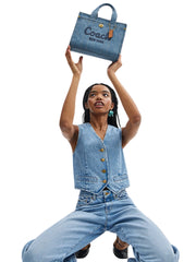 on-model-1-Coach-Cargo-Denim-Tote-Bag-26-Indigo