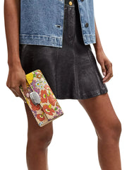 on-model-1-Coach-Eliza-Small-Flap-Crossbody-With-Floral-Print-Ivory-Multi