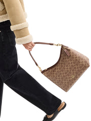 on-model-1-Coach-Laurel-Shoulder-Bag-In-Signature-Canvas-Tan-Brown