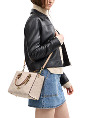 on-model-1-Coach-Maggie-Small-Tote-Bag-In-Blocked-Signature-Canvas-Sand-Tan