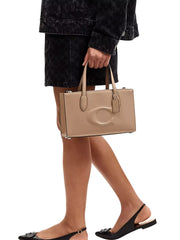 on-model-1-Coach-Nina-Small-Tote-Bag-Debossed-C-Taupe