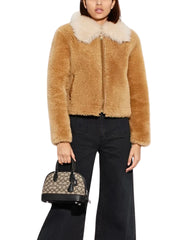 on-model-1-Coach-Ravel-Bag-24-In-Signature-Textile-Jacquard-Cocoa-Black