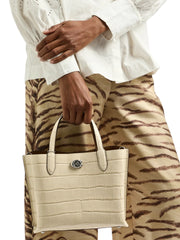 on-model-1-Coach-Willow-Tote-Bag-24-Croc-Embossed-Ivory