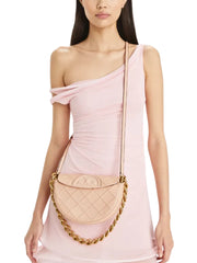 on-model-1-Tory-Burch-Fleming-Soft-Grain-Mini-Crescent-Bag-Blush