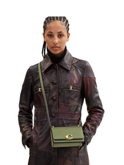 on-model-2-Coach-Bandit-Crossbody-Bag-Moss