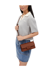 on-model-2-Coach-Eliza-Flap-Crossbody-Bag-Redwood
