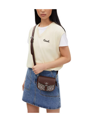 on-model-Coach-Amelia-Small-Saddle-Bag-In-Signature-Jacquard-OakMaple