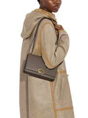 on-model-Coach-Bandit-Shoulder-Bag-Dark-Stone