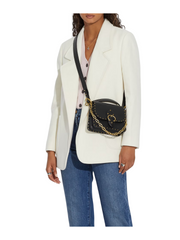 on-model-Coach-Beat-Shoulder-Bag-18-With-Rivets-In-Black