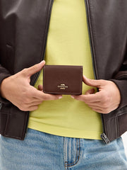 on-model-Coach-Card-Holder-Wallet-In-Signature-Canvas-Tan-Brown