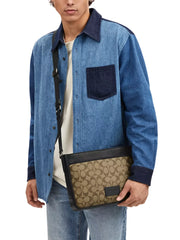 on-model-Coach-District-Crossbody-In-Signature-Canvas-Khaki-Black