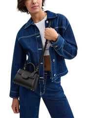 on-model-Coach-Eliza-Mini-Top-Handle-Bag-Black