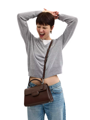 on-model-Coach-Eliza-Top-Handle-Bag-Maple