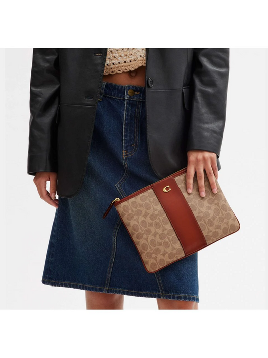 on-model-Coach-Essential-Pouch-28-In-Signature-Canvas-Tan-Rust