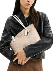 on-model-Coach-Fiona-Zip-Tote-Bag-In-Signature-Canvas-Sand-Chalk