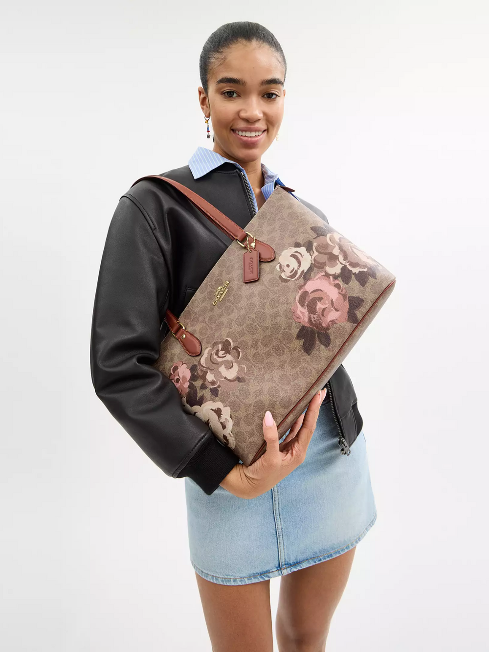 on-model-Coach-Gallery-Tote-Bag-In-Signature-Canvas-With-Rose-Print-Gold-Tan-Multi
