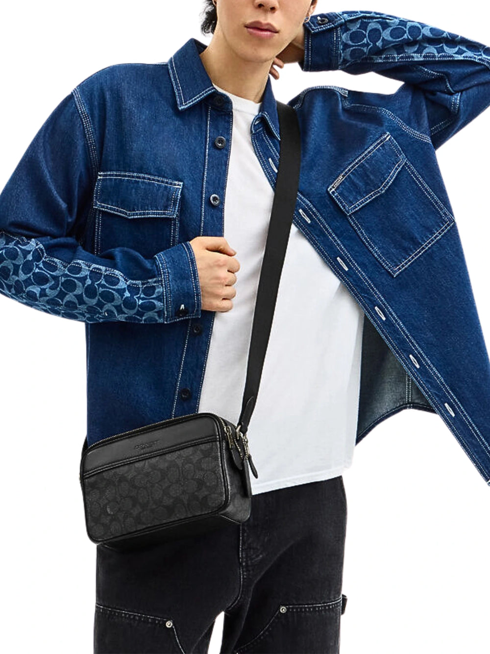 on-model-Coach-Graham-Crossbody-Bag-In-Signature-Canvas-Charcoal-Black