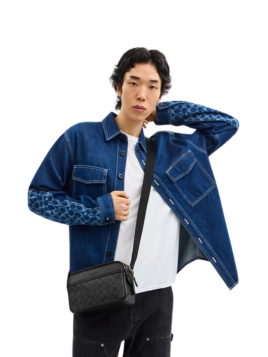 on-model-Coach-Graham-Crossbody-Bag-In-Signature-Canvas-Charcoal-Black