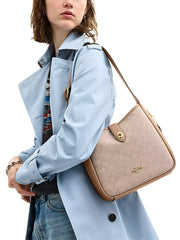 on-model-Coach-Hadley-Convertible-Crossbody-Bag-With-Signature-Canvas-Dark-Natural-Multi