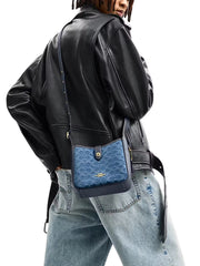 on-model-Coach-Hadley-Mini-Crossbody-Bag-In-Signature-Denim-Indigo