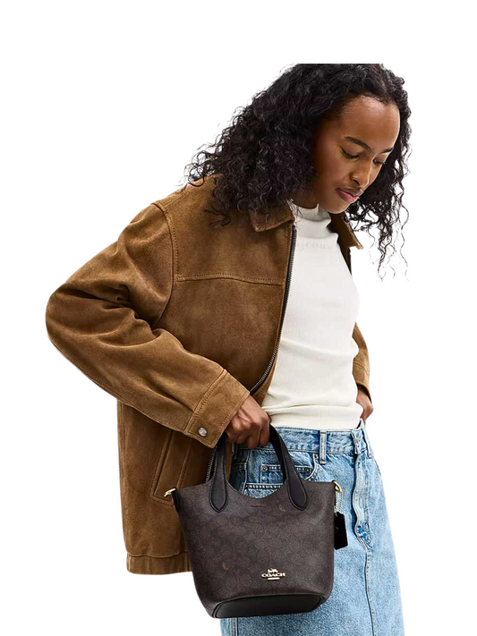 on-model-Coach-Hanna-Bucket-Bag-In-Signature-Canvas-Walnut-Black