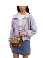 on-model-Coach-Klare-Crossbody-Bag-In-Signature-Canvas-With-Floral-Print-Khaki-Multi