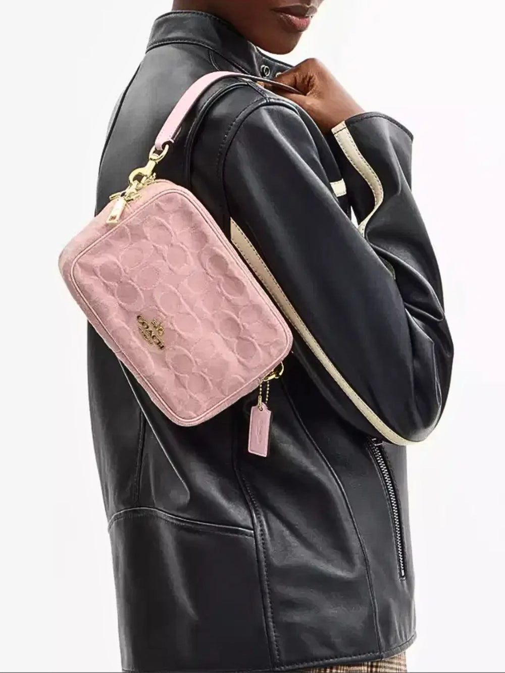on-model-Coach-Mini-Carey-Crossbody-Bag-In-Signature-Denim-Light-Pink