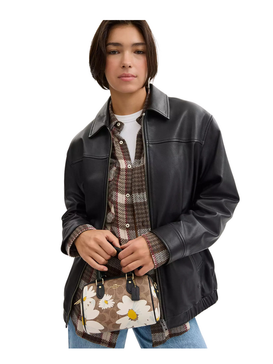 on-model-Coach-Mini-Rowan-Crossbody-Bag-In-Signature-Canvas-With-FloraL-Print-Tan-Multi