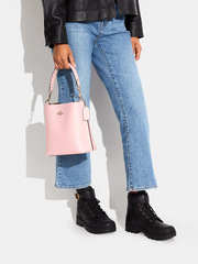 on-model-Coach-Mollie-Bucket-22-With-Signature-Canvas-Interior-Powder-Pink-Light-Khaki