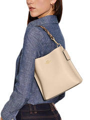 on-model-Coach-Mollie-Bucket-Bag-22-Snake-Embossed-Leather-Ivory-Multi
