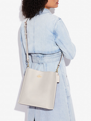 on-model-Coach-Mollie-Bucket-Bag-Chalk