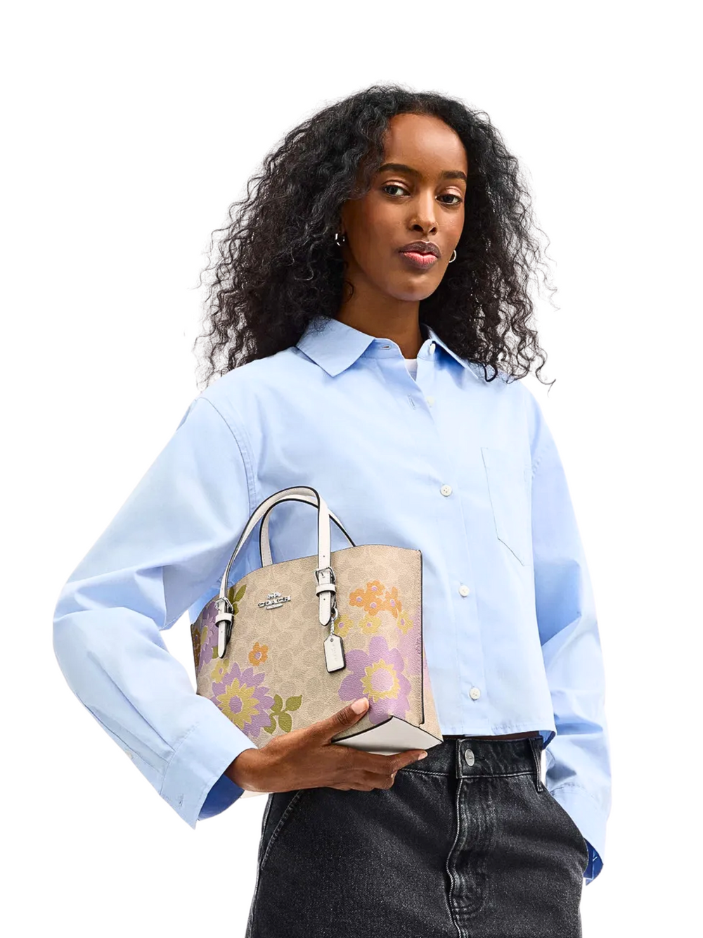 on-model-Coach-Mollie-Tote-Bag-25-In-Signature-Canvas-With-Floral-Print-Sand-Multi
