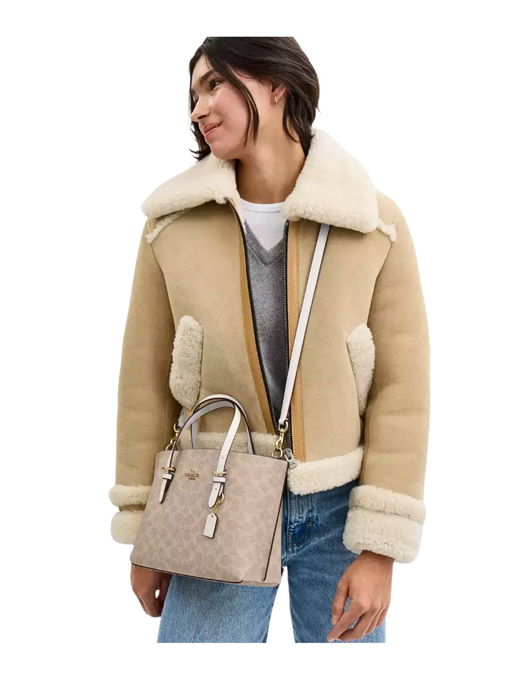 on-model-Coach-Mollie-Tote-Bag-25-In_-Signature-Canvas-Sand-Chalk