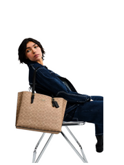 on-model-Coach-Mollie-Tote-In-Signature-Canvas-Tan-Black