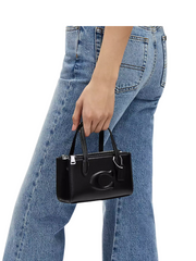 on-model-Coach-Nina-Mini-Tote-Bag-Black