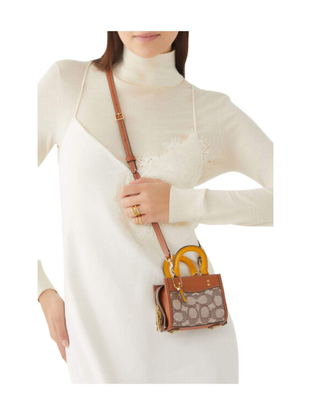 on-model-Coach-Rogue-12-Cocoa-Burnished-Amber